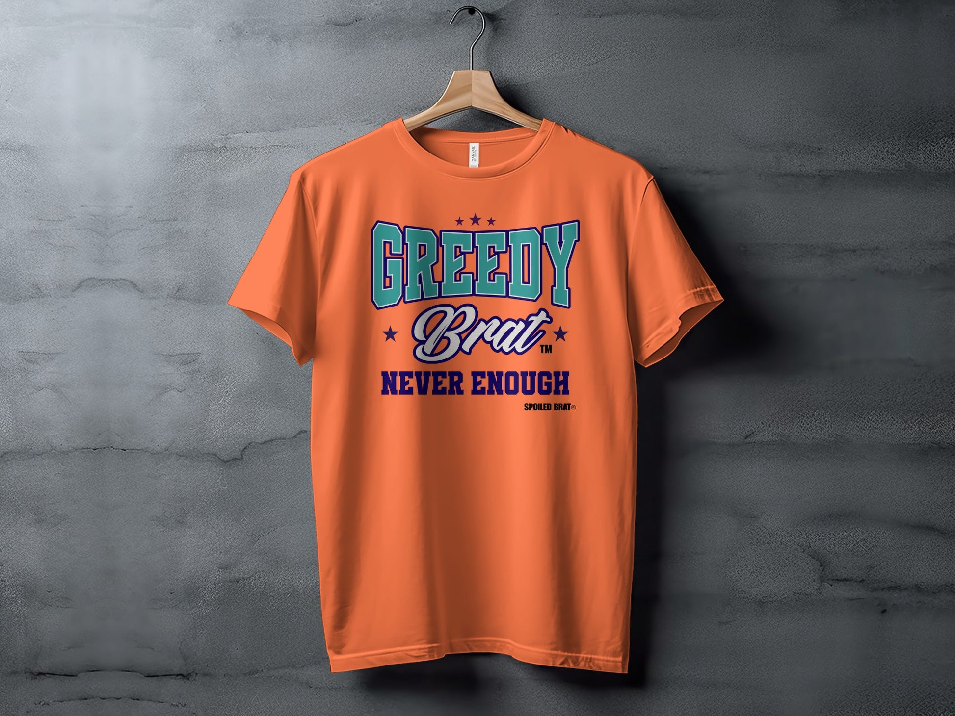 Orange t-shirt with "GREEDY Brat NEVER ENOUGH" text and stars.