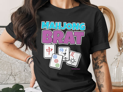 Black t-shirt with "MAHJONG BRAT" text and Mahjong tiles.