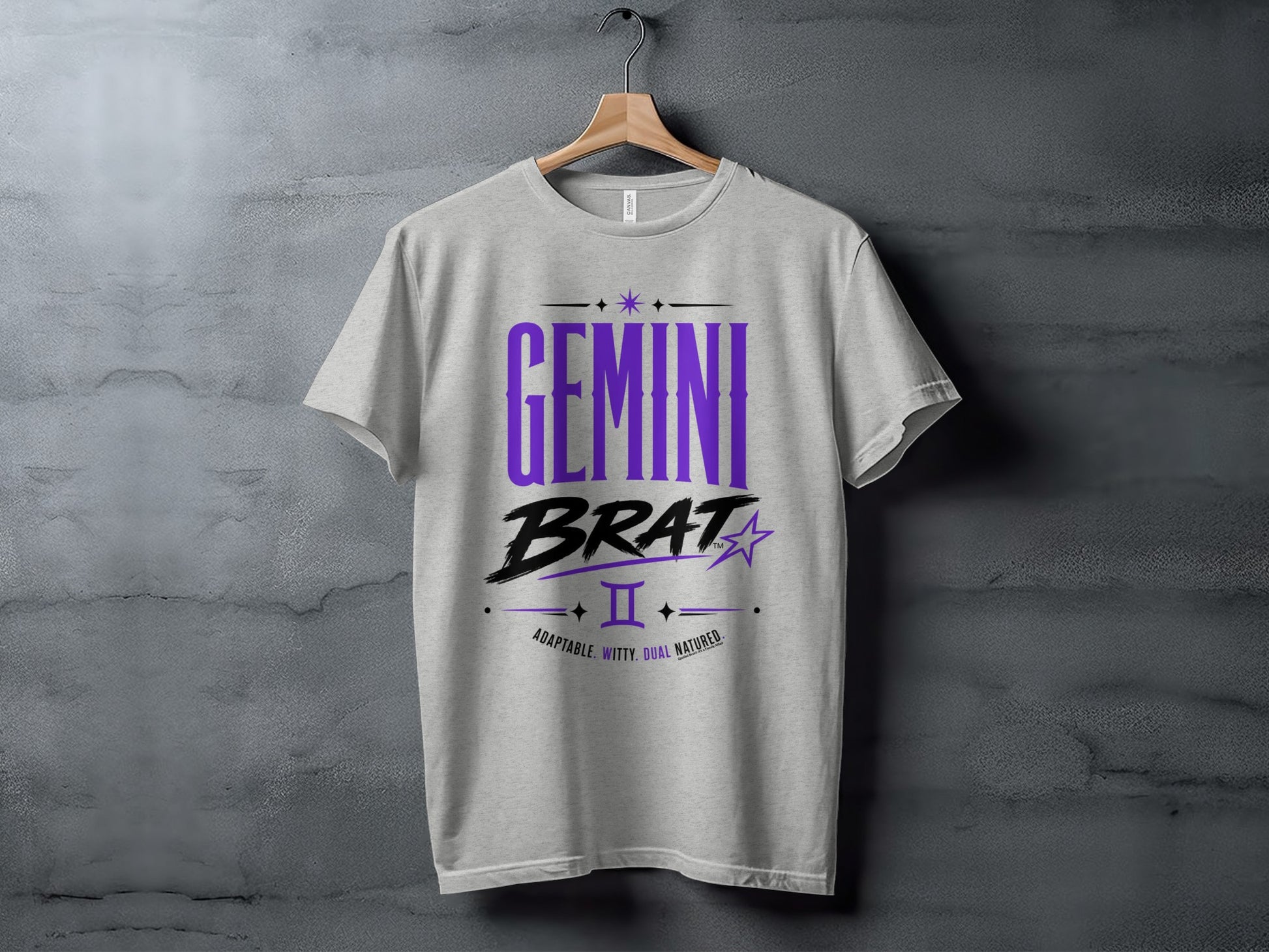 Light gray t-shirt with "GEMINI BRAT" text and zodiac symbols.