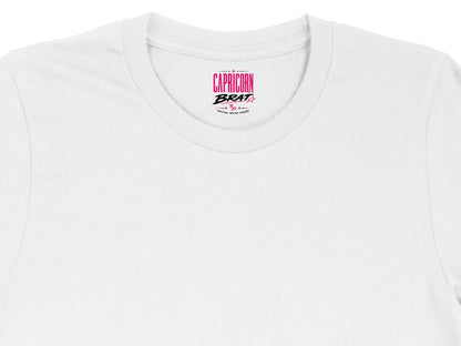White t-shirt with "Capricorn Brat" graphic and Capricorn symbol.