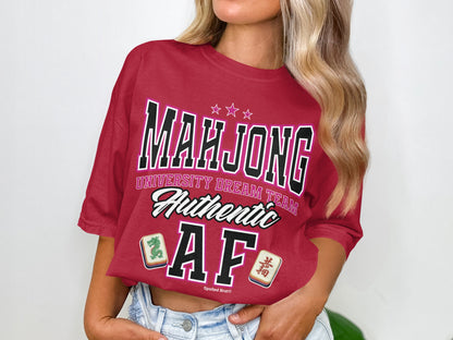 Mahjong University Dream Team Authentic AF graphic t-shirt in dark pink.