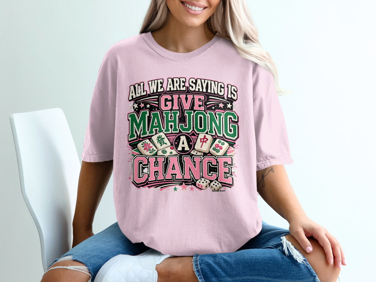 Pink t-shirt with "Give Mahjong A Chance" text and Mahjong tiles.
