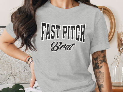 Grey t-shirt with "FAST PITCH Brat" text graphic on the front.
