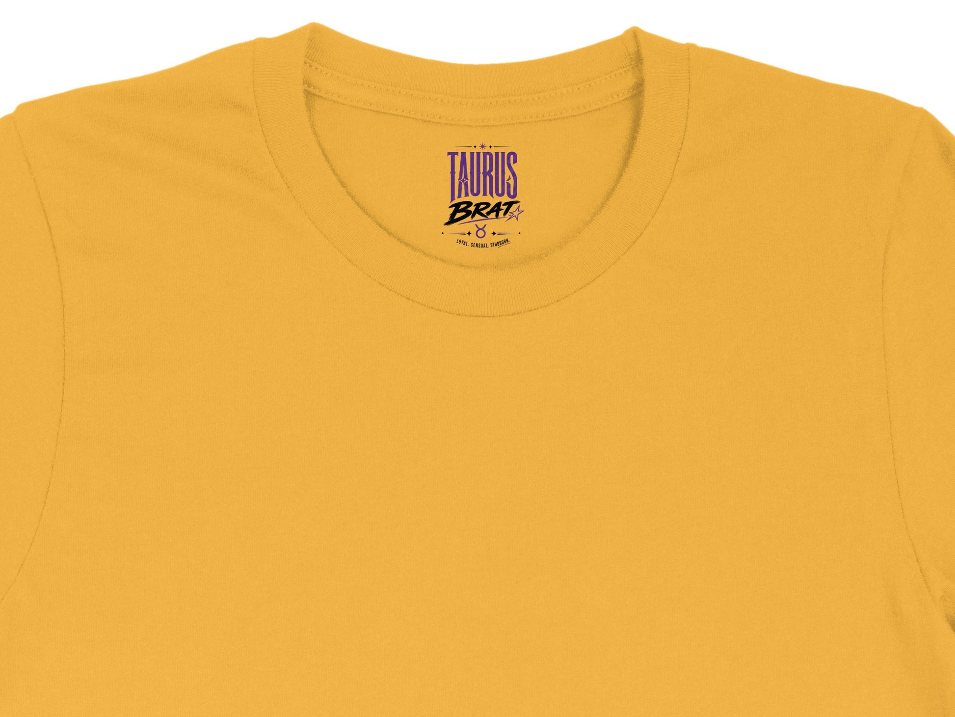 Yellow t-shirt with "TAURUS BRAT Loyal. Sensual. Stubborn." text.