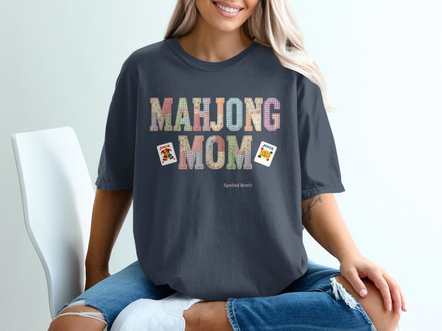 Dark gray t-shirt with "Mahjong Mom" text and two Joker cards.