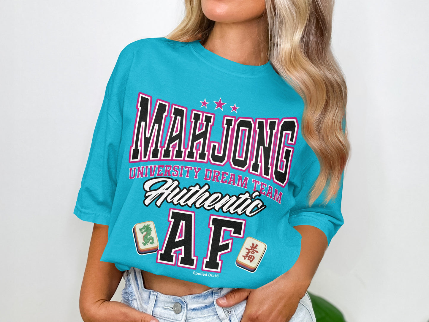 Turquoise t-shirt with "Mahjong University Dream Team Authentic AF" and Mahjong tiles.