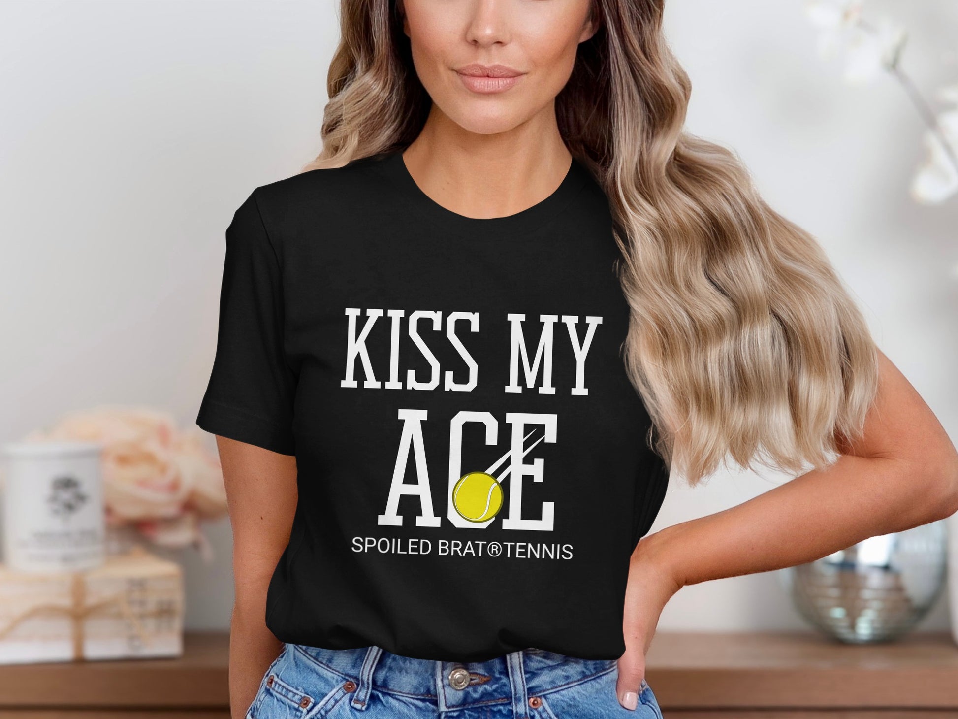 Black t-shirt with "Kiss My Ace" and tennis ball graphic.