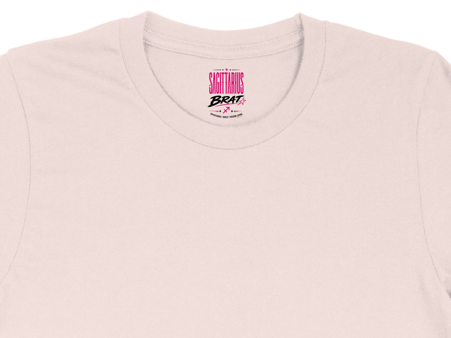 Pink t-shirt collar with Sagittarius Brat logo and zodiac symbols.