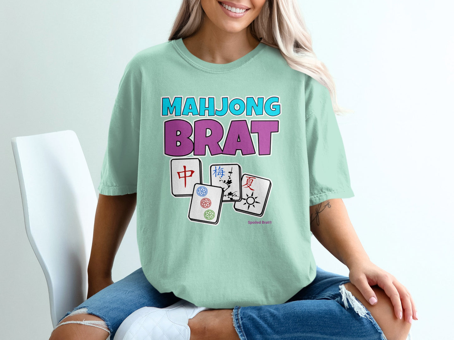 T-shirt with "Mahjong Brat" text and Mahjong tiles.