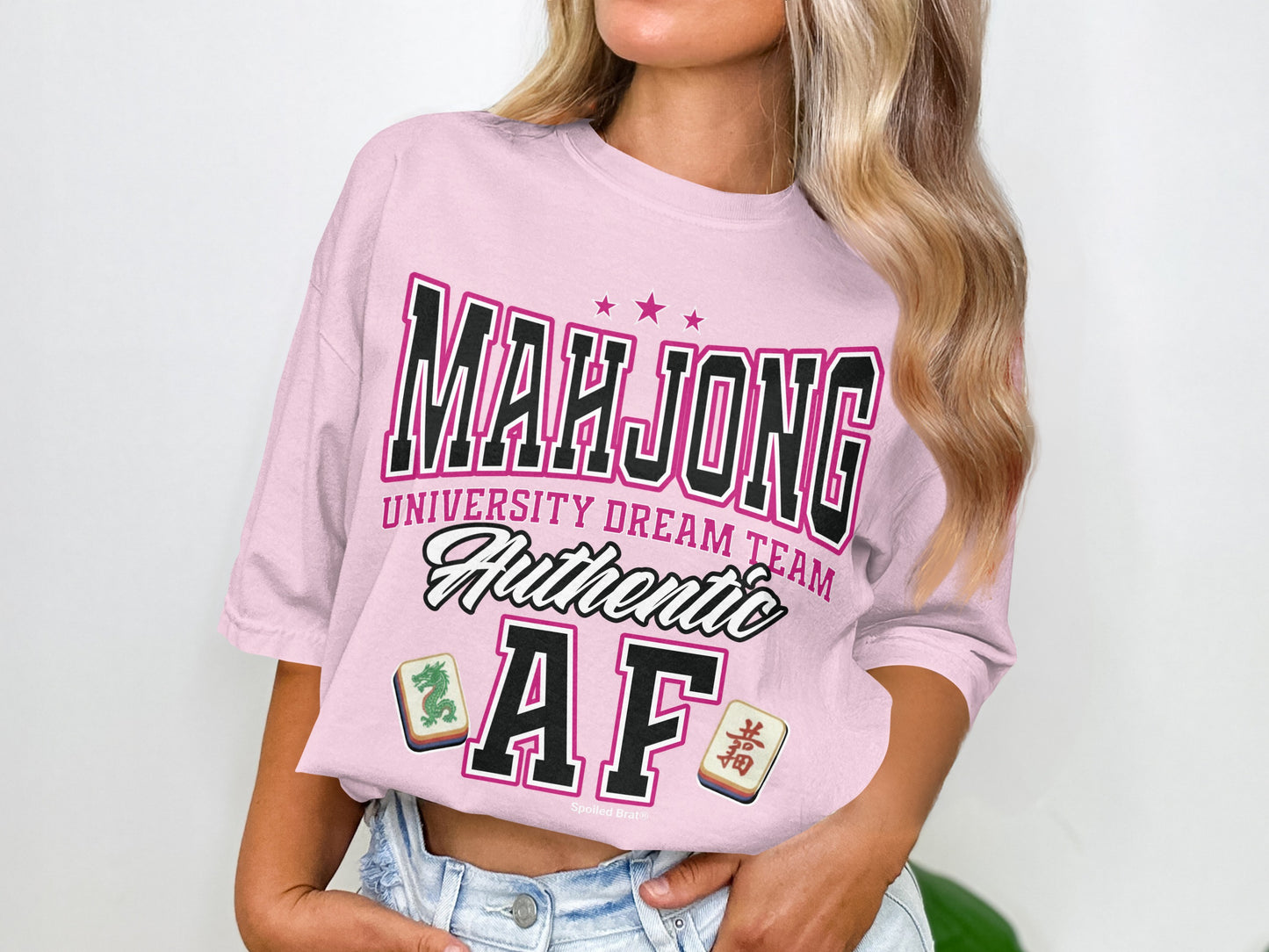 Pink t-shirt with "MAHJONG UNIVERSITY DREAM TEAM AUTHENTIC AF" and Mahjong tiles.