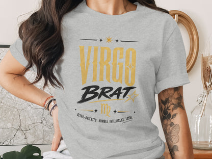 Grey t-shirt with "VIRGO BRAT" text and Virgo zodiac symbol.