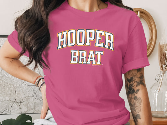 Pink t-shirt with "HOOPER BRAT" text on chest