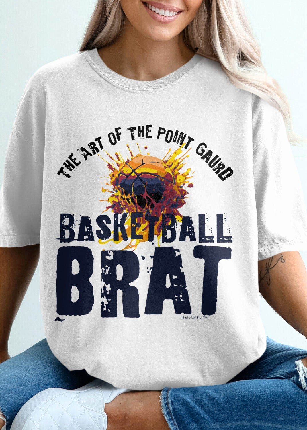 White t-shirt with "Basketball BRAT" and basketball art graphic.