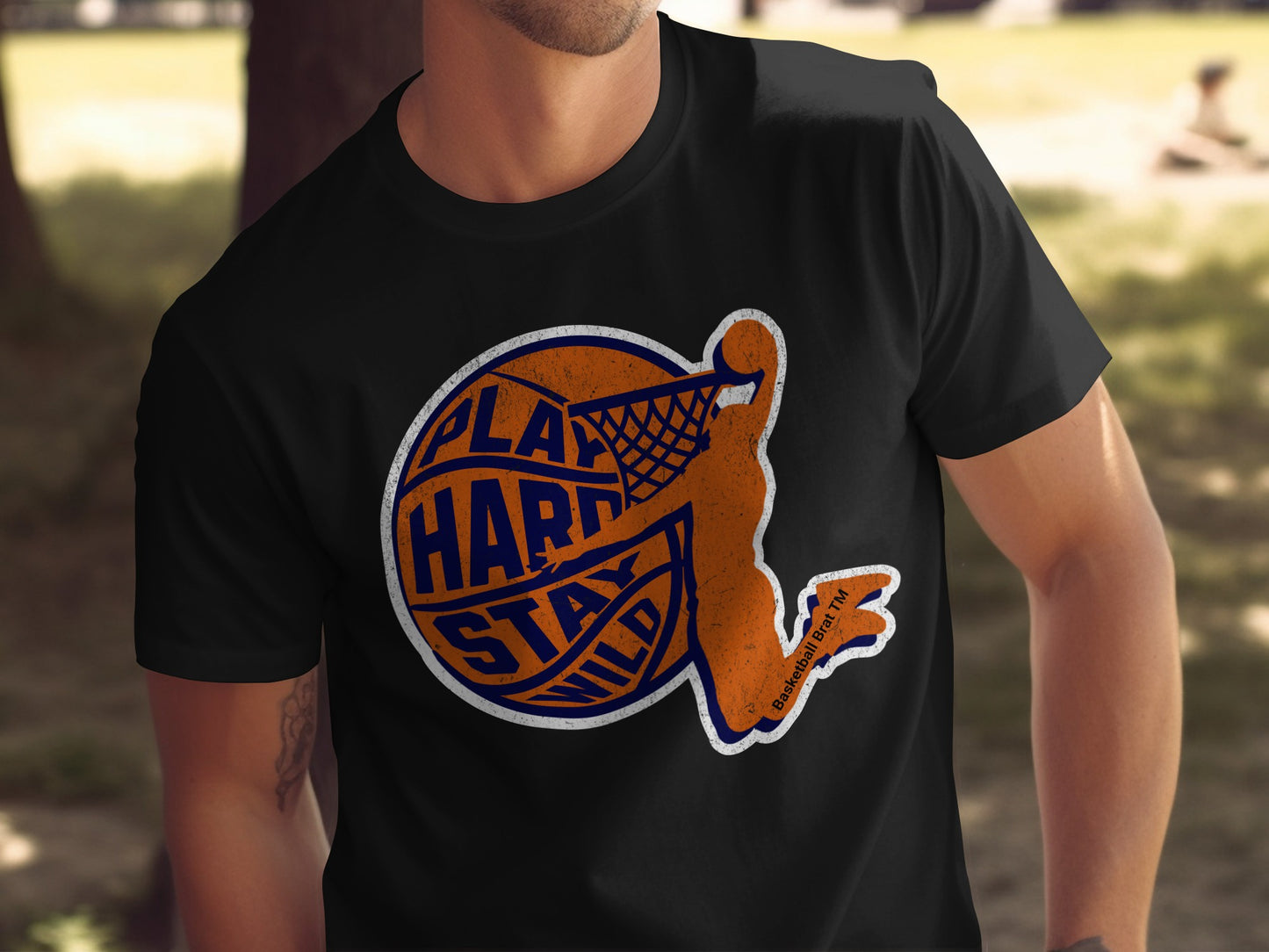 Black t-shirt with orange and blue basketball graphic and text.