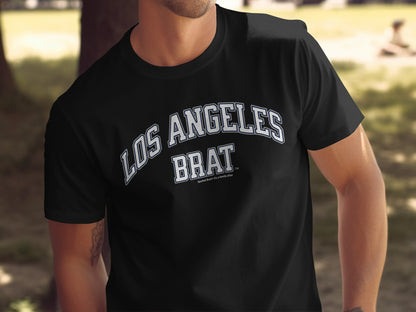 Black t-shirt with "LOS ANGELES BRAT" text in white arched lettering.