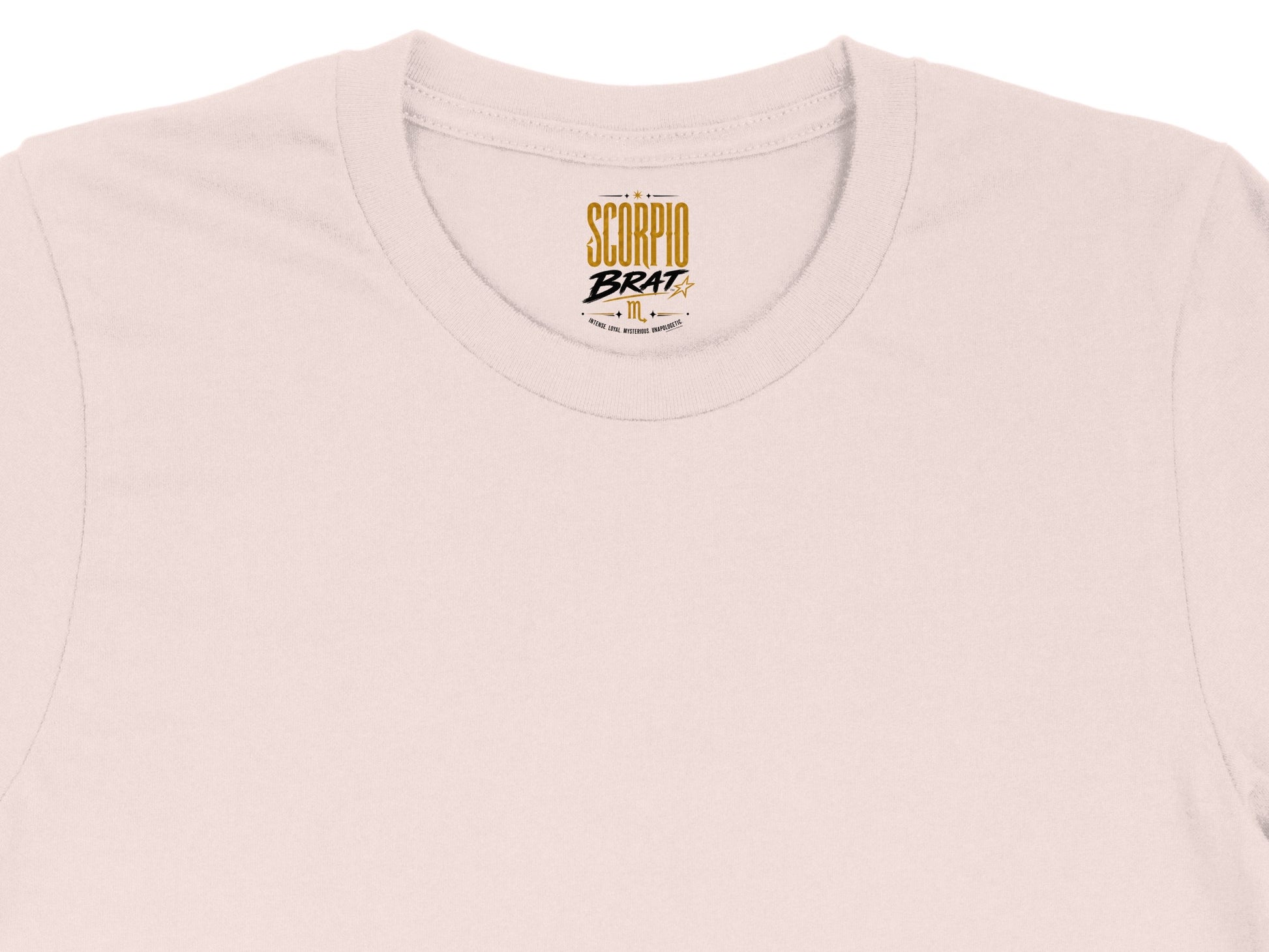 Light pink t-shirt with "Scorpio Brat" logo and zodiac symbol.