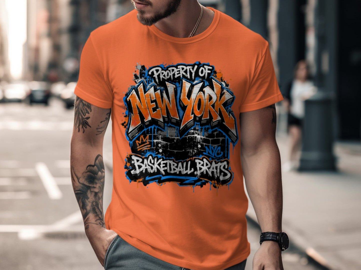 Orange t-shirt with "Property of New York Basketball Brats" graffiti design.