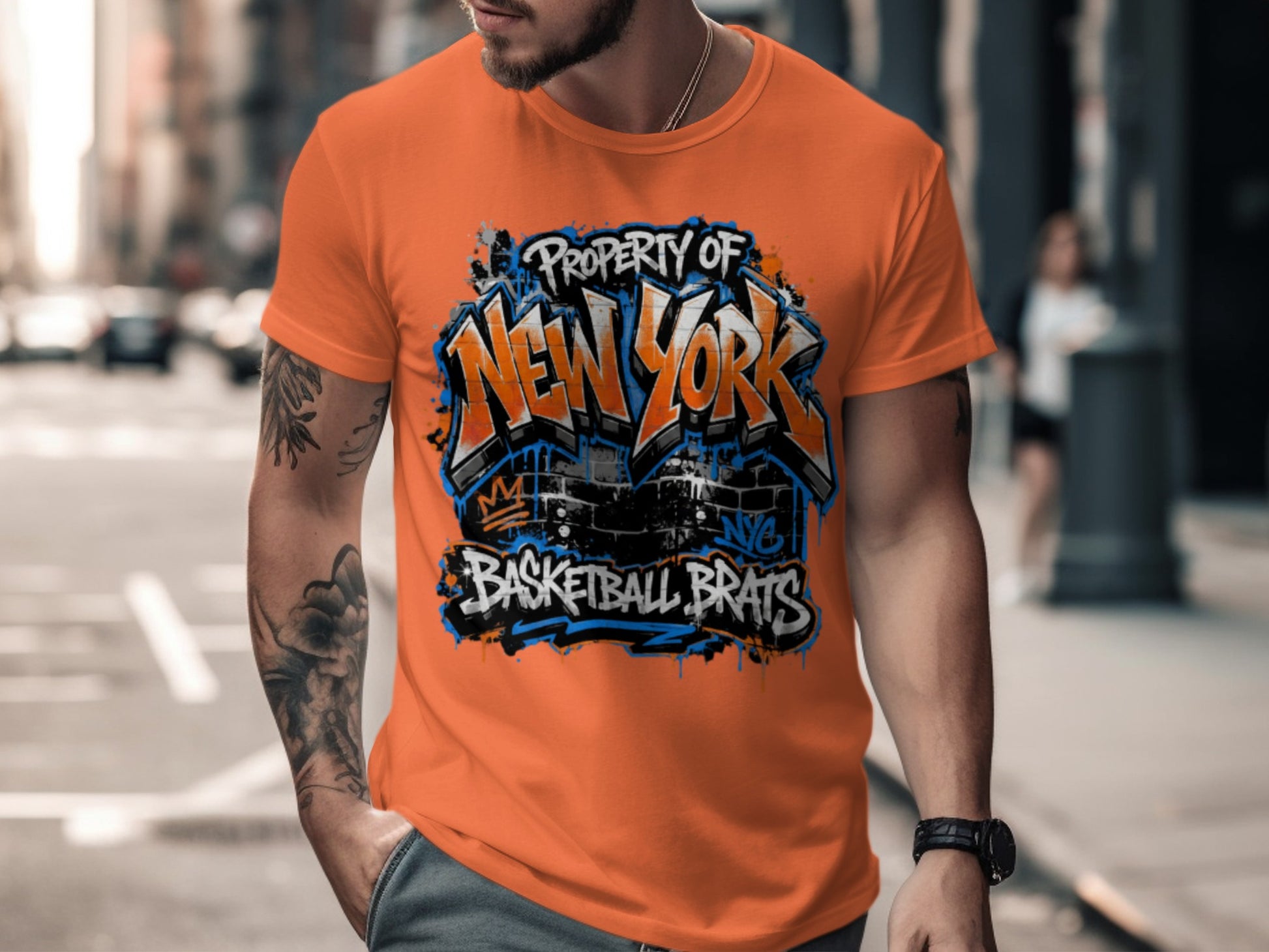 Orange t-shirt with "Property of New York Basketball Brats" graffiti design.