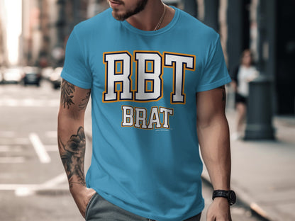 Blue t-shirt with "RBT BRAT" text in white with yellow and navy outline