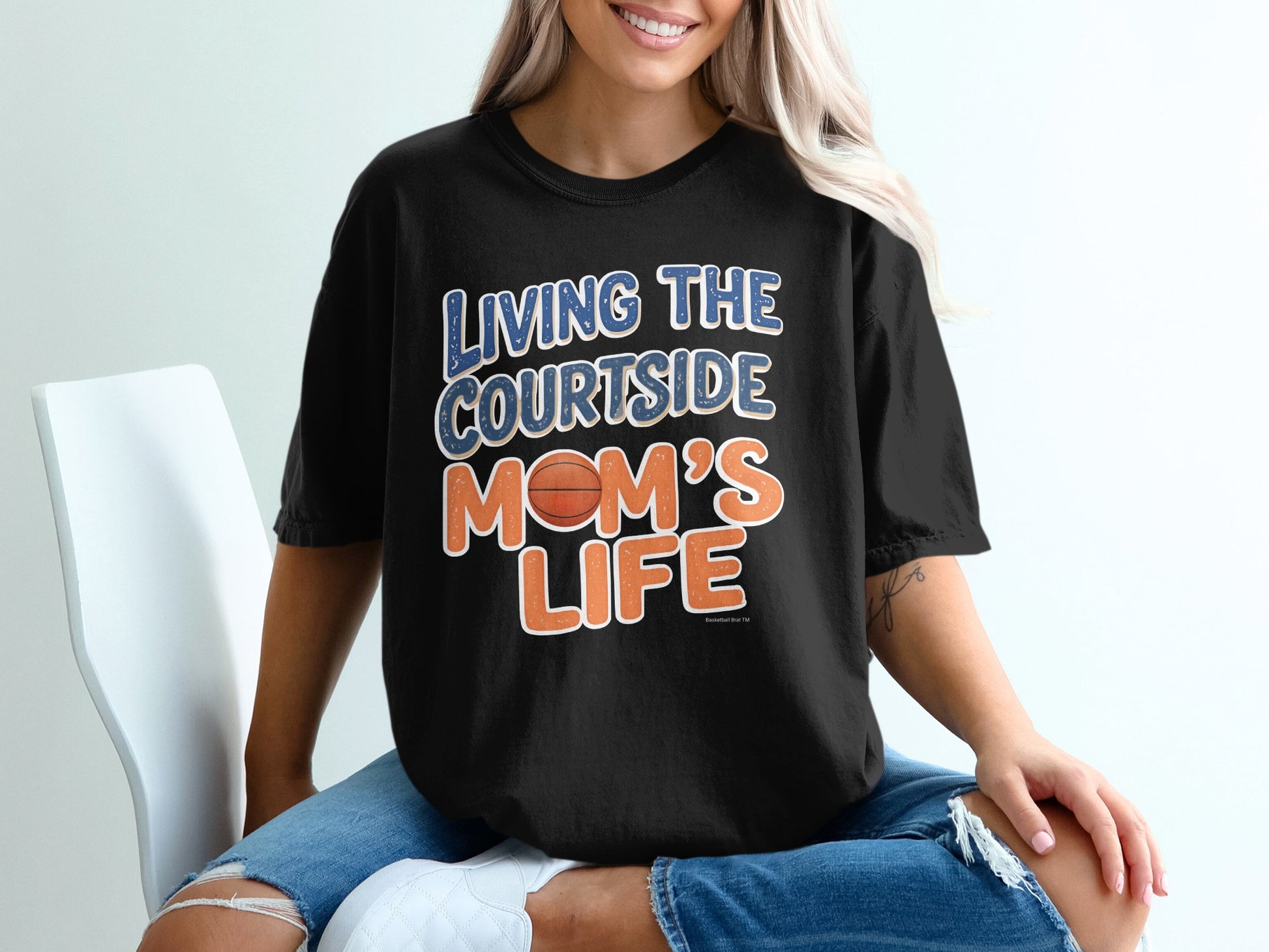 Black t-shirt with "Living The Courtside Mom's Life" and a basketball graphic.