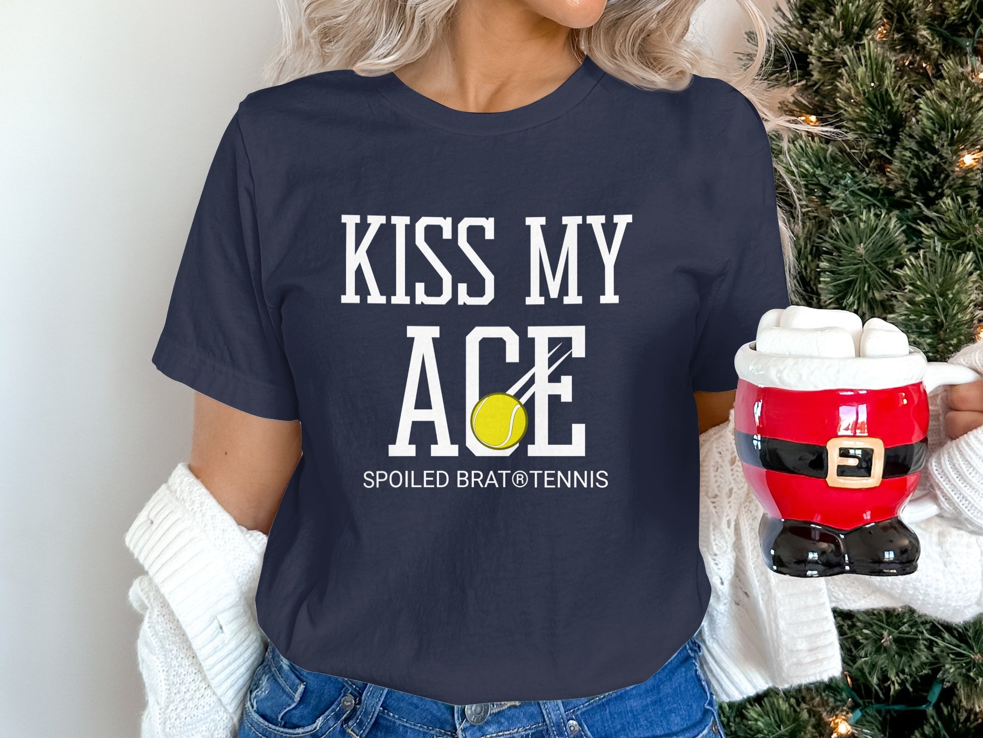 Navy t-shirt with "KISS MY ACE" and tennis ball graphic.