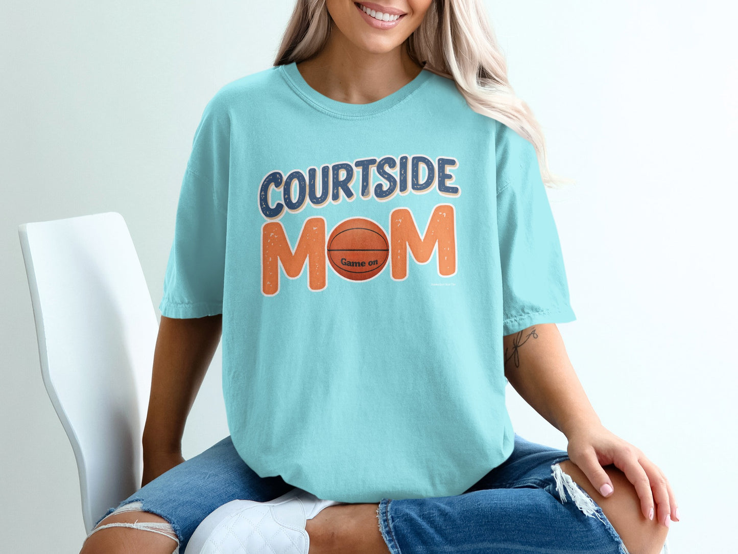 Teal t-shirt with "Courtside Mom Game On" and a basketball graphic.