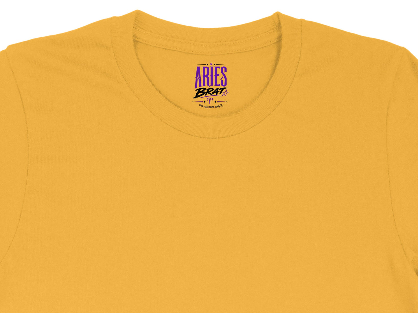 Yellow t-shirt collar with "Aries Brat" graphic and horoscope symbol.