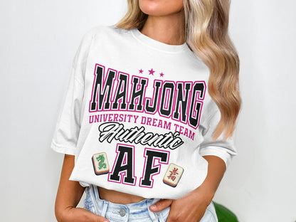White t-shirt with "Mahjong University Dream Team Authentic AF" and mahjong tiles.