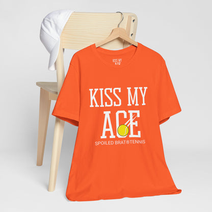 Orange t-shirt with "KISS MY ACE" and tennis ball graphic.