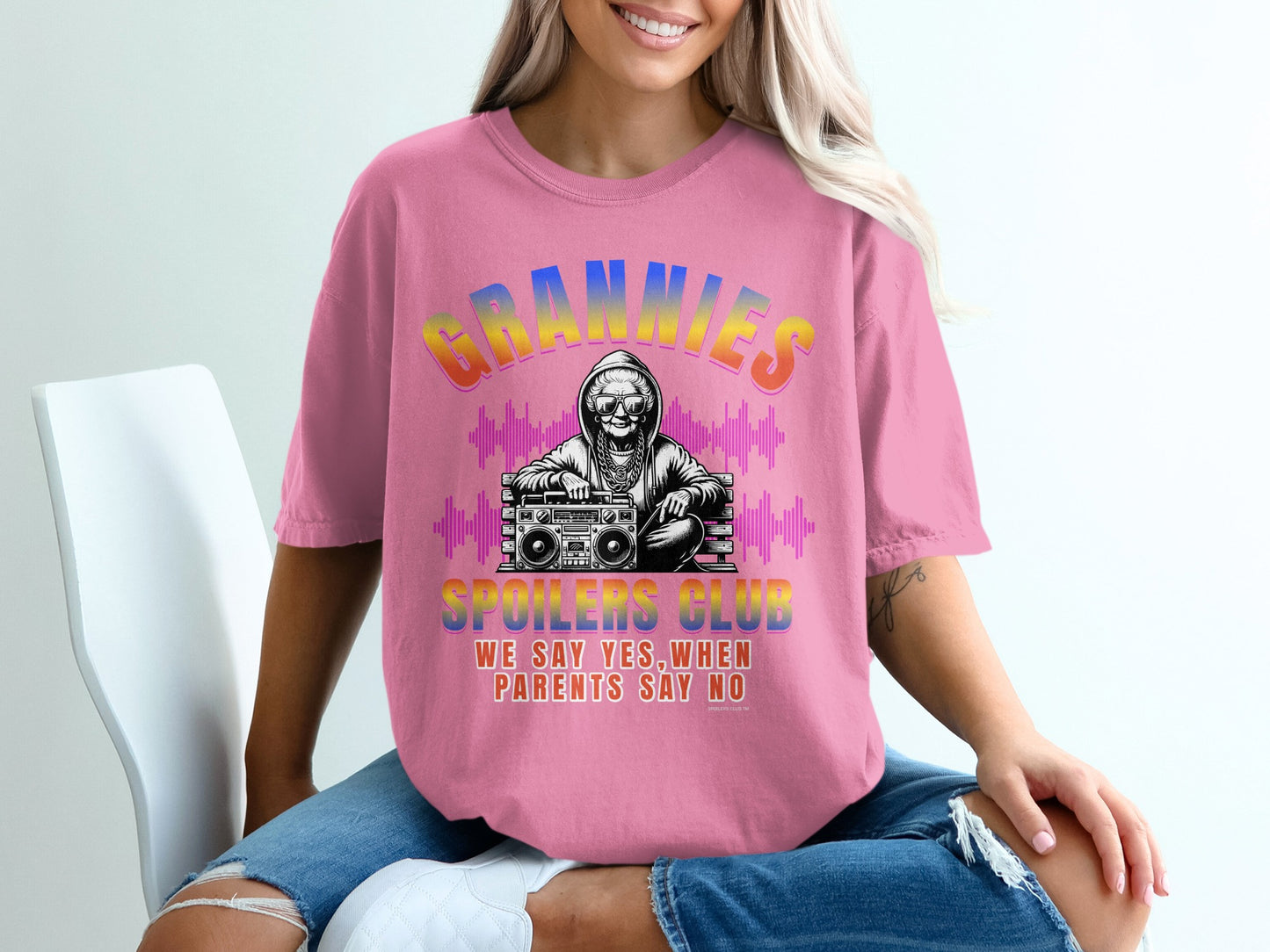 Pink t-shirt with "Grannies Club" and boombox graphic.