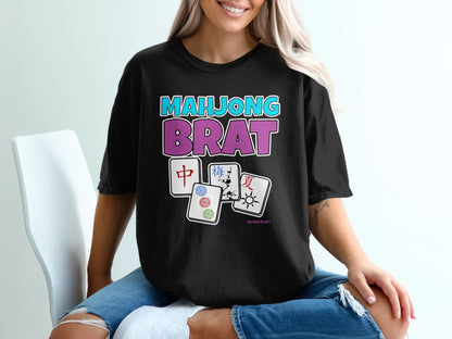 Black t-shirt with "MAHJONG BRAT" text and Mahjong tiles.