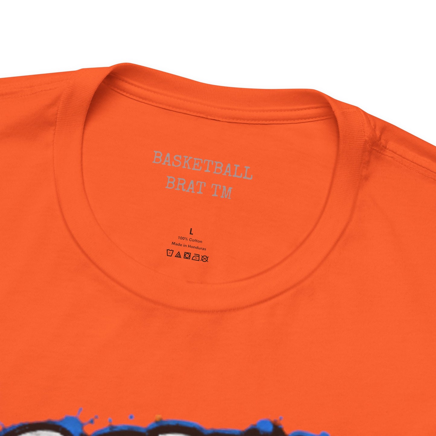 Orange t-shirt with "Basketball Brat" text and washing instructions.