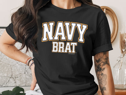 Black t-shirt with white "NAVY BRAT" text in collegiate font.