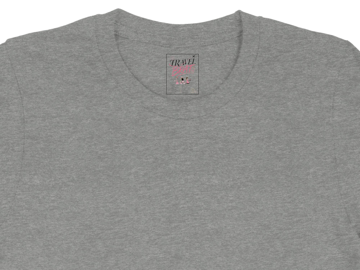 Gray t-shirt with "TRAVEL BEAT" text and city list inside a pink rectangle.