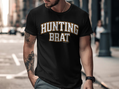 Black t-shirt with "HUNTING BRAT" in white and orange varsity lettering.