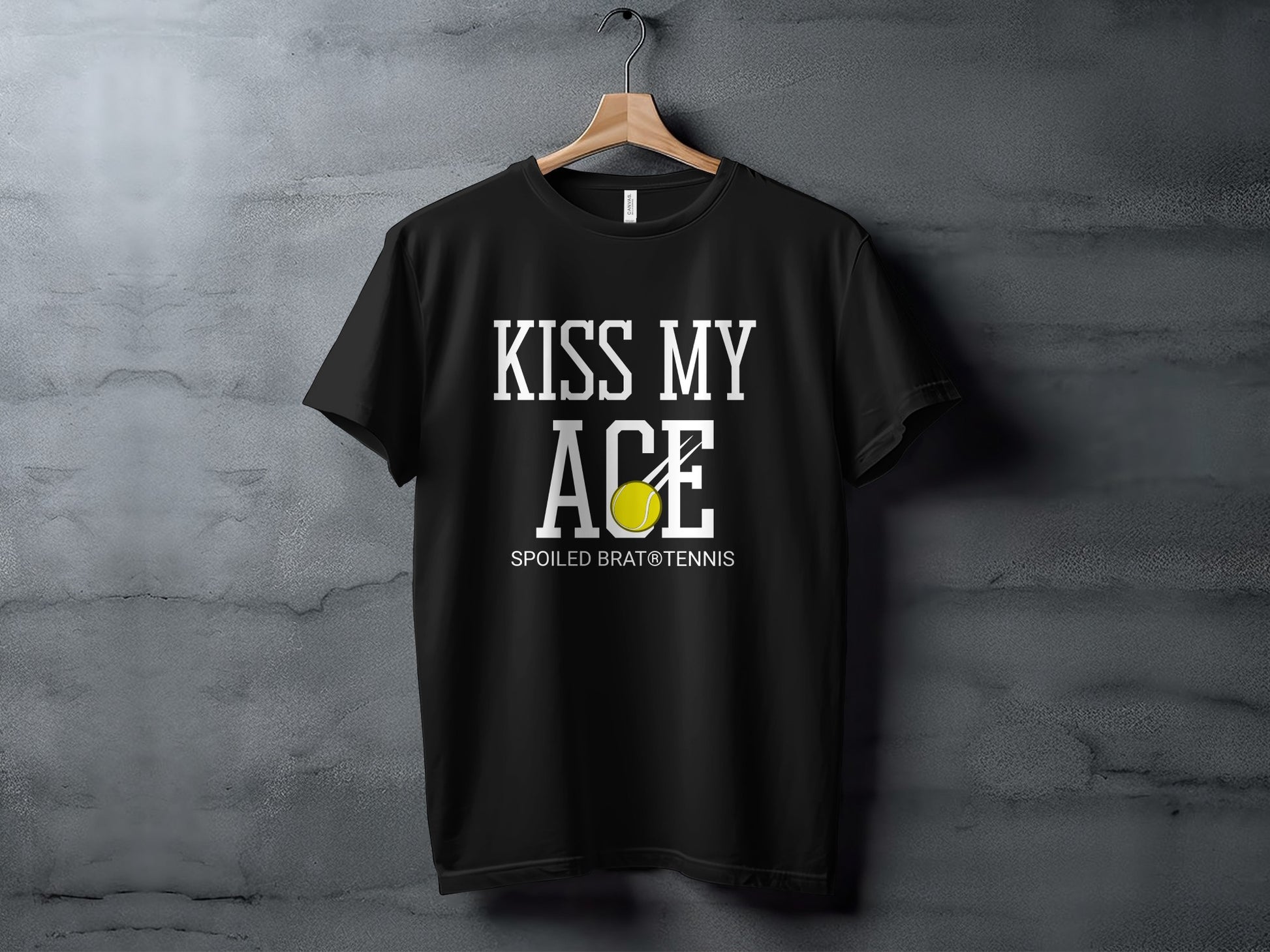 Black t-shirt with "KISS MY ACE" and "SPOLIED BRAT® TENNIS" text.