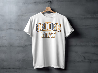 White t-shirt with "BRIDGE BRAT" text in a collegiate font.