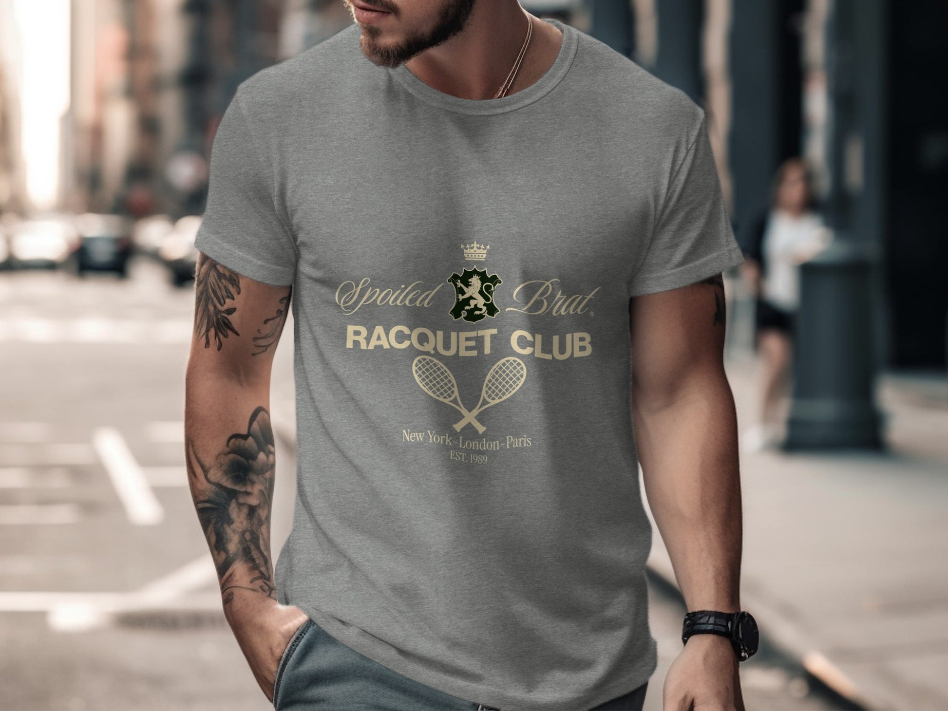 Grey t-shirt with "Spoiled Brat Racquet Club" and crossed tennis rackets logo.