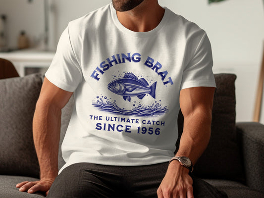 White t-shirt with "FISHING BRAT THE ULTIMATE CATCH SINCE 1956" text and fish graphic.