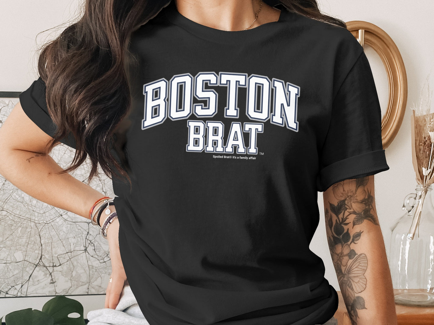 Black t-shirt with white "BOSTON BRAT" text and smaller "Spoiled Brat. It's a family affair."
