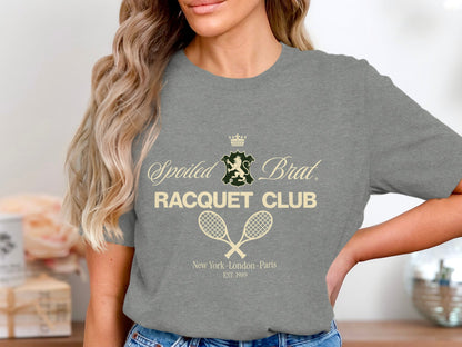 Grey t-shirt with "Spoiled Brat Racquet Club" and crossed tennis rackets.