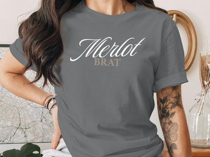 Gray t-shirt with white and tan text that reads "Merlot BRAT".