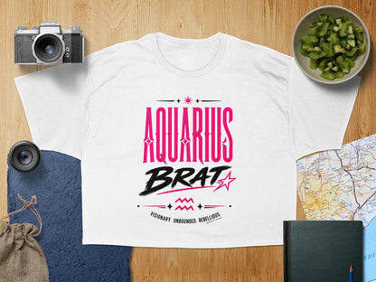 White t-shirt with "AQUARIUS BRAT" text and astrological symbols.