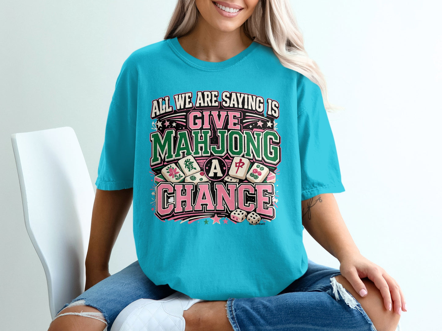 T-shirt with "All we are saying is give Mahjong a chance" text and Mahjong tiles.