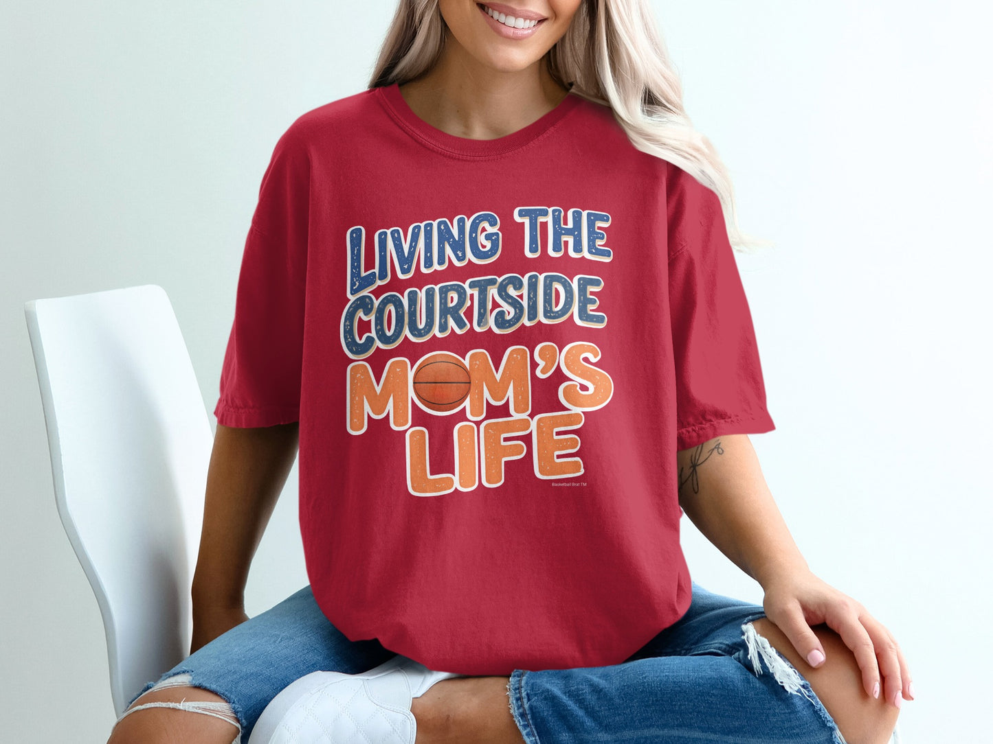 Red t-shirt with "Living the Courtside Mom's Life" text and basketball graphic.