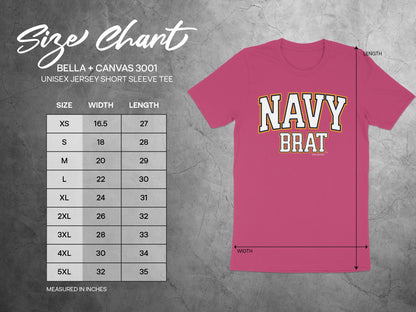 Pink t-shirt with "NAVY BRAT" graphic and a size chart for Bella + Canvas 3001 unisex tees.