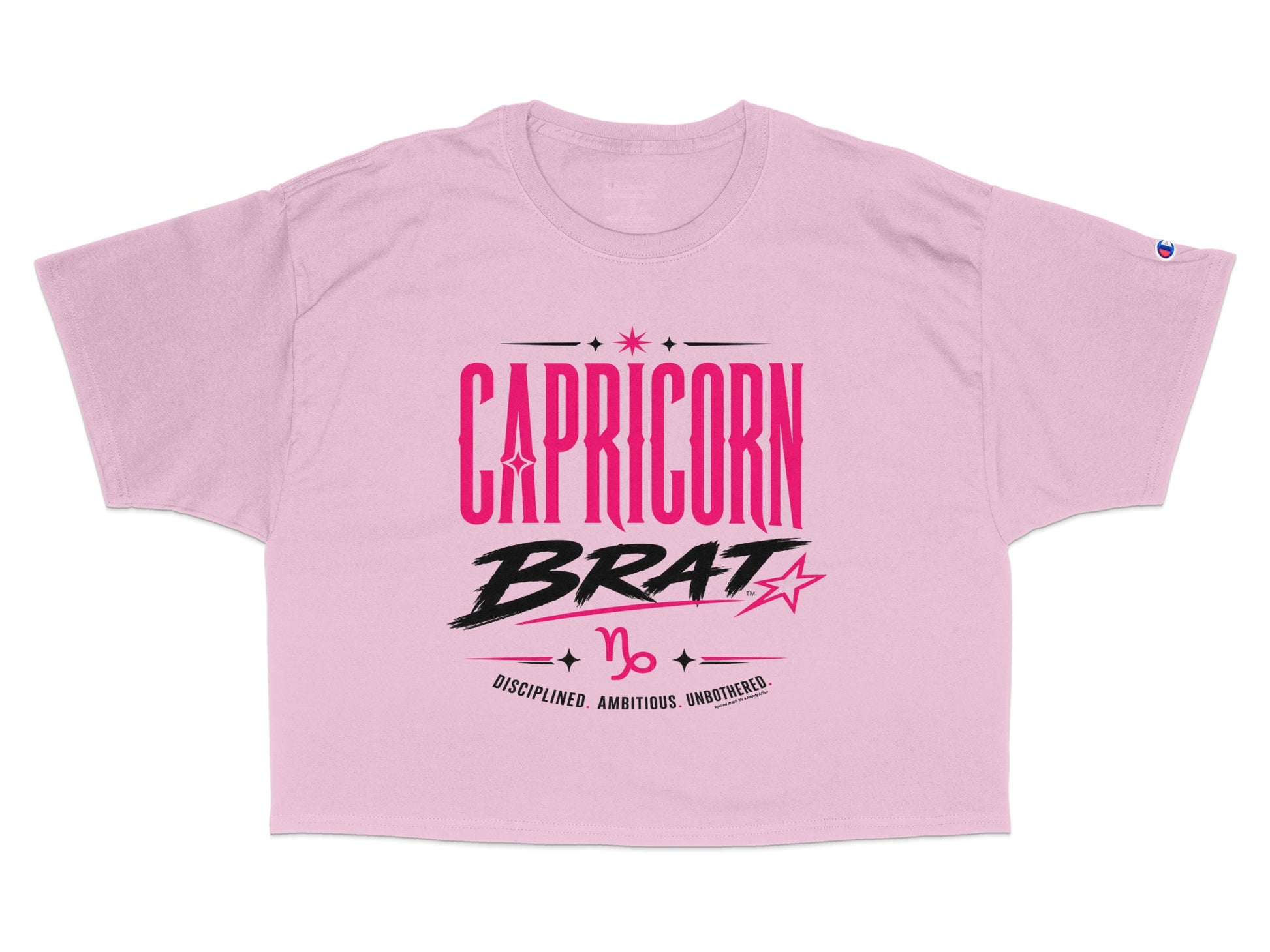 Pink cropped t-shirt with "CAPRICORN BRAT" text and zodiac symbol.