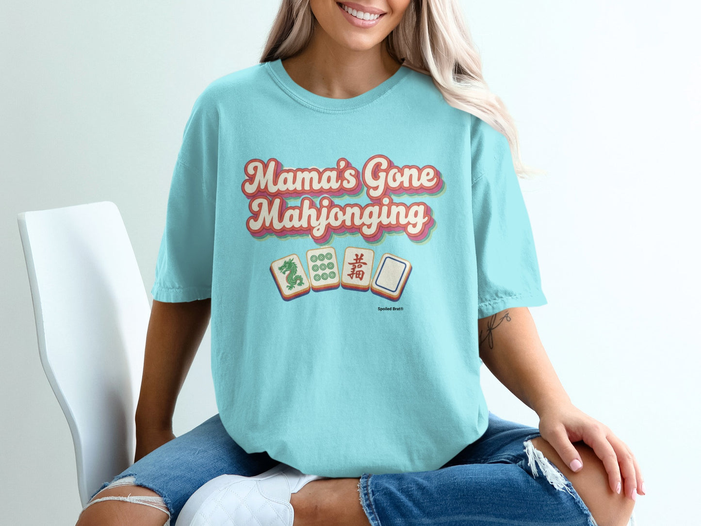 Aqua t-shirt with "Mama's Gone Mahjonging" and mahjong tiles.