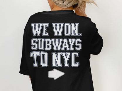 Black t-shirt with "WE WON. SUBWAYS TO NYC" and a white arrow.