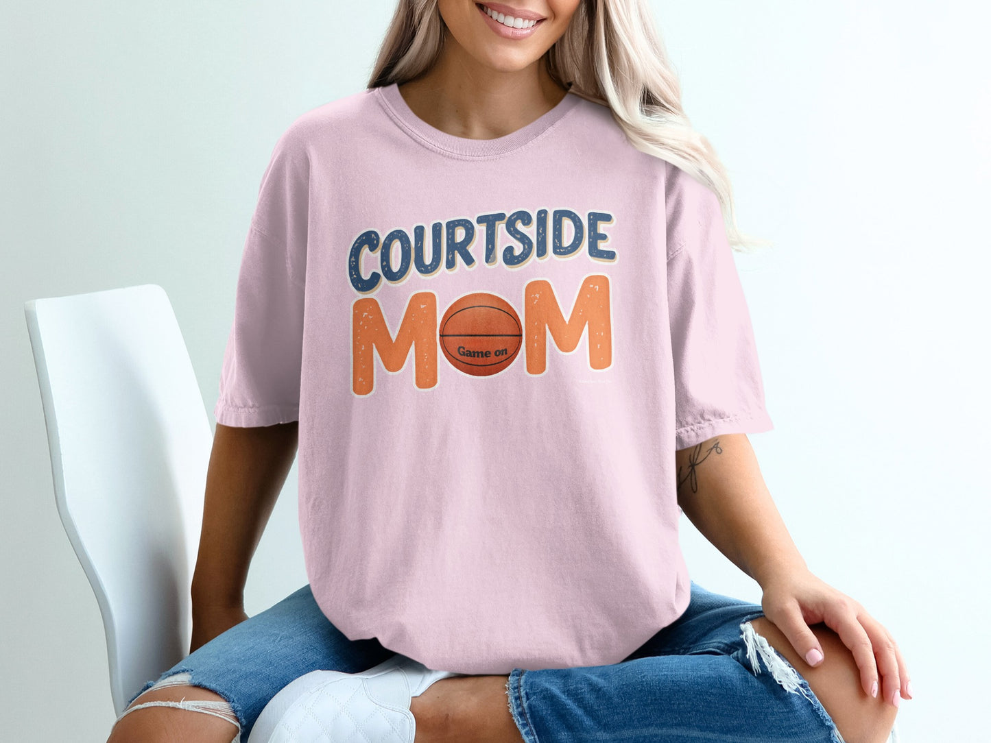 Pink t-shirt with "Courtside Mom" and a basketball graphic.